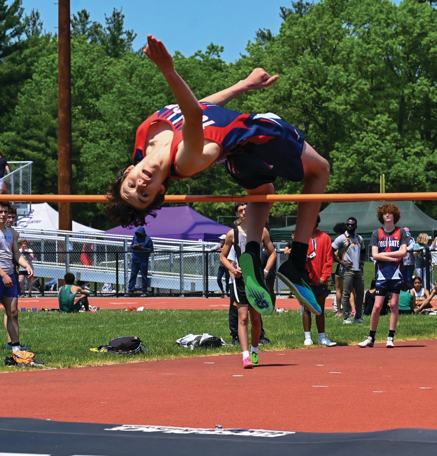 HIGH JUMP: Toll Gate’s Kevin Barker competes in the high jump.